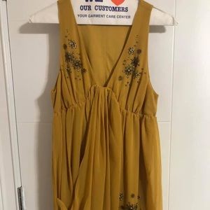 Gold dress with rhinestones